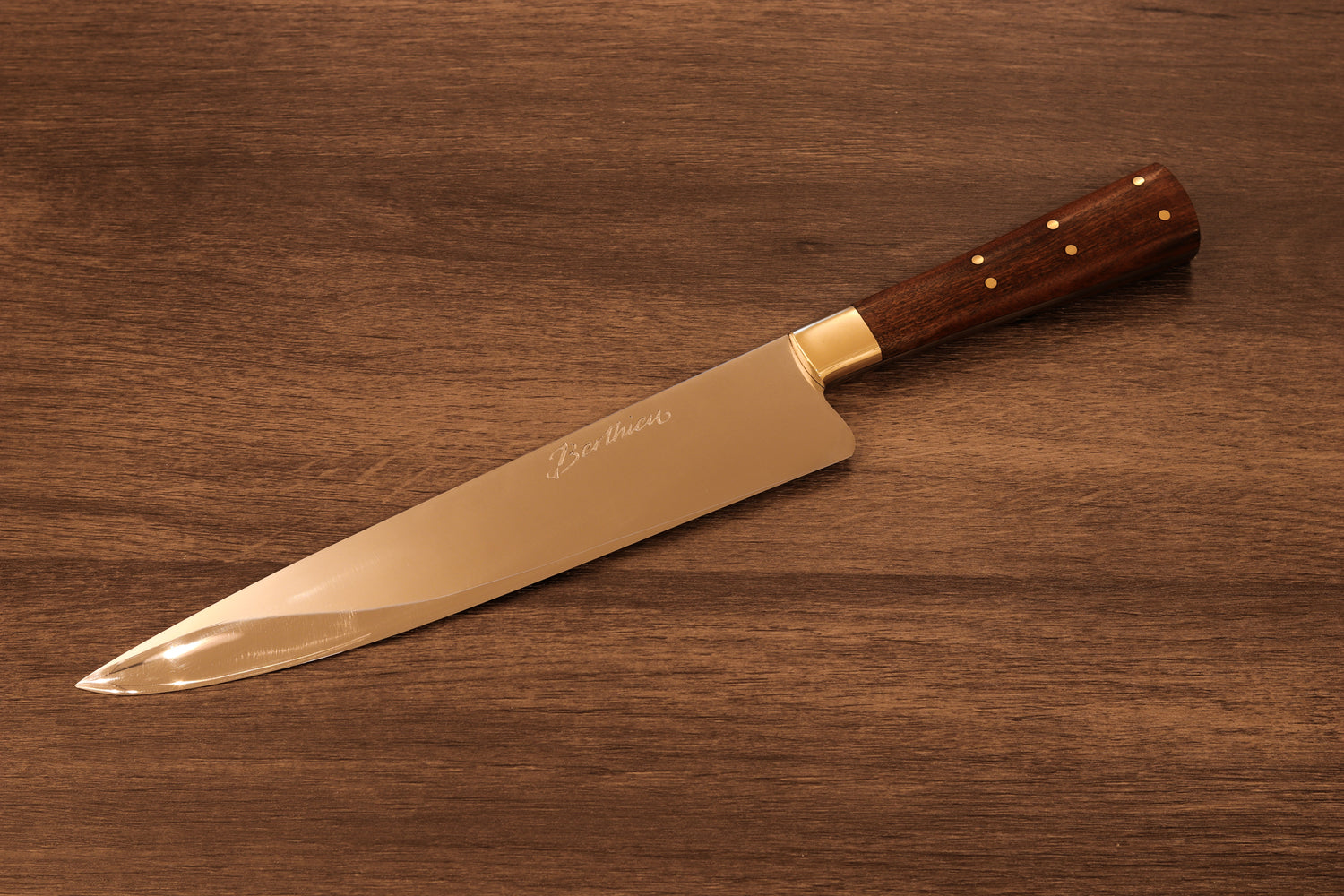 Berthieu Criollo 24 cm artisan knife with micarta handle and molybdenum stainless steel blade, handcrafted in Argentina for kitchen and outdoor use.